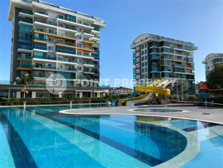 Меблированная квартира 65 м2, в комплексе с  роскошной инфраструктурой и собственным пляжем, район Авсаллар-id-2406-фото-1