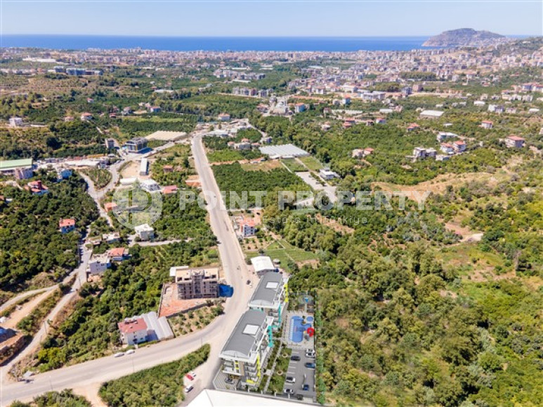 Investment project of a complex with good infrastructure, at the foot of the mountains in the Alanya-Oba region-id-2407-photo-5