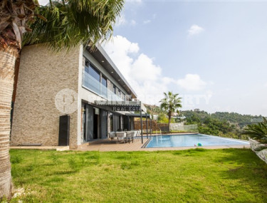 Фешенебельная вилла с четырьмя спальнями, 400м², с потрясающими видами в горах, в центре Алании-id-2409-фото-2