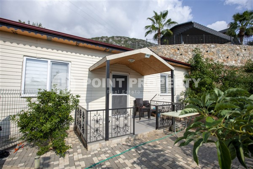 Фешенебельная вилла с четырьмя спальнями, 400м², с потрясающими видами в горах, в центре Алании-id-2409-фото-23