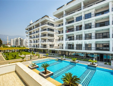 Квартира с двумя спальнями, 120м², в элитном комплексе в 100м от моря в районе Каргыджак, Алания-id-2411-фото-1
