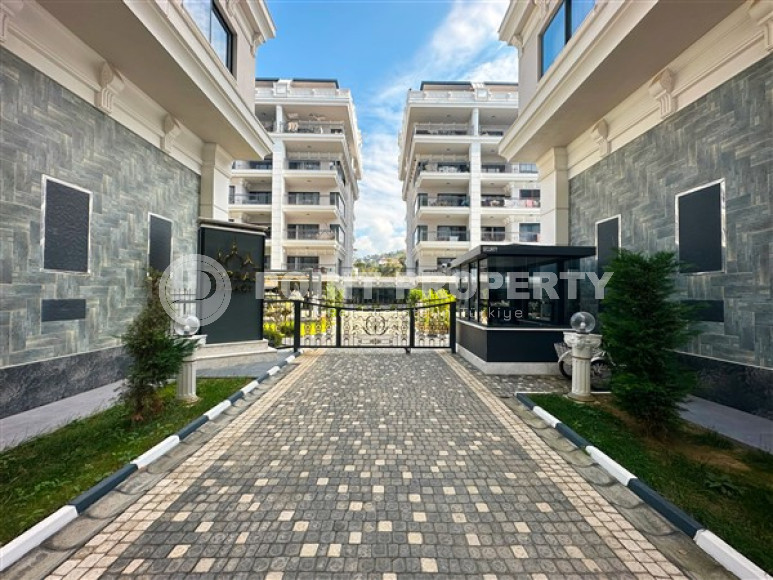 Квартира с двумя спальнями, 120м², в элитном комплексе в 100м от моря в районе Каргыджак, Алания-id-2411-фото-3