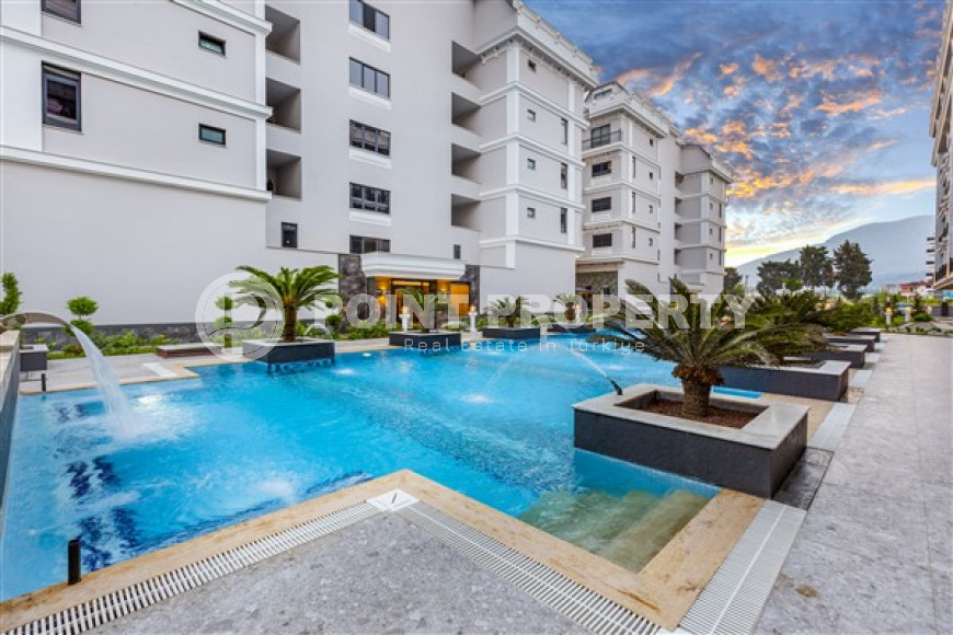 Квартира с двумя спальнями, 120м², в элитном комплексе в 100м от моря в районе Каргыджак, Алания-id-2411-фото-4