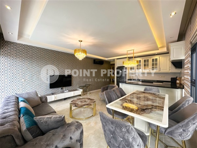 Квартира с двумя спальнями, 120м², в элитном комплексе в 100м от моря в районе Каргыджак, Алания-id-2411-фото-9