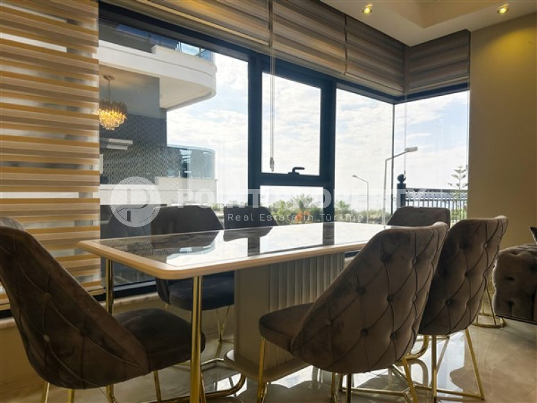 Квартира с двумя спальнями, 120м², в элитном комплексе в 100м от моря в районе Каргыджак, Алания-id-2411-фото-11