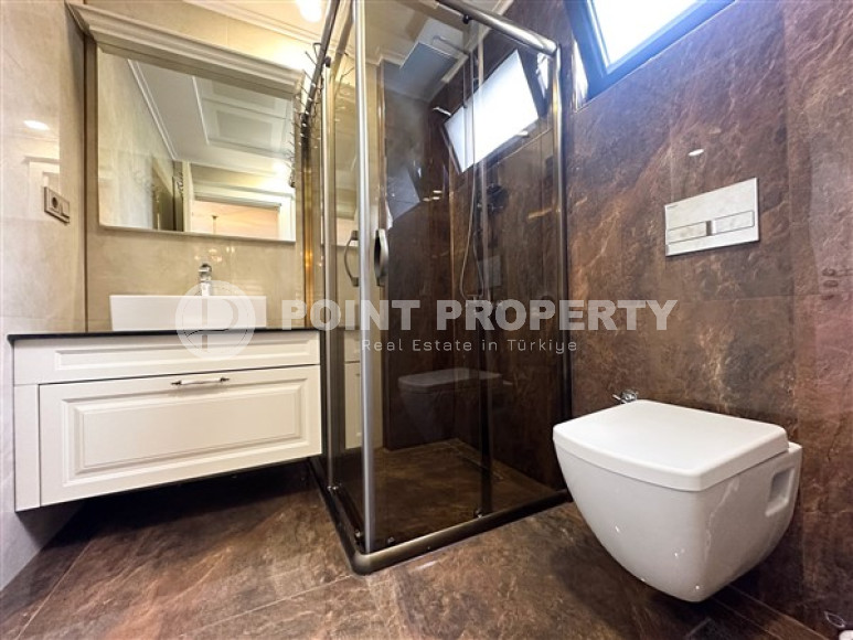 Квартира с двумя спальнями, 120м², в элитном комплексе в 100м от моря в районе Каргыджак, Алания-id-2411-фото-14