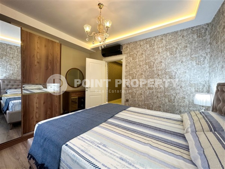 Квартира с двумя спальнями, 120м², в элитном комплексе в 100м от моря в районе Каргыджак, Алания-id-2411-фото-16