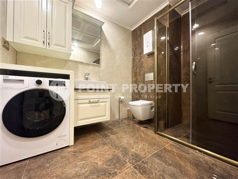 Квартира с двумя спальнями, 120м², в элитном комплексе в 100м от моря в районе Каргыджак, Алания-id-2411-фото-17