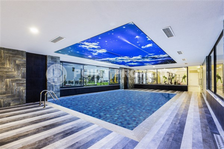 Квартира с двумя спальнями, 120м², в элитном комплексе в 100м от моря в районе Каргыджак, Алания-id-2411-фото-20