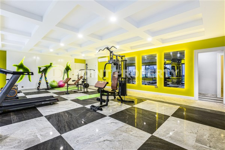 Квартира с двумя спальнями, 120м², в элитном комплексе в 100м от моря в районе Каргыджак, Алания-id-2411-фото-23