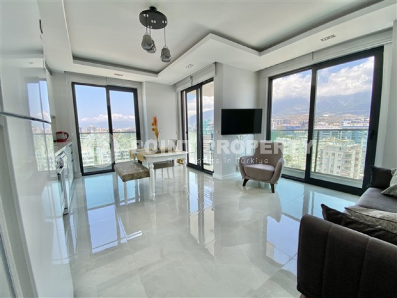 Furnished three-room apartment, 85m², on the first coastline in Mahmutlar, Alanya-id-2412-photo-3