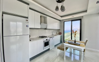 Furnished three-room apartment, 85m², on the first coastline in Mahmutlar, Alanya-id-2412-photo-5