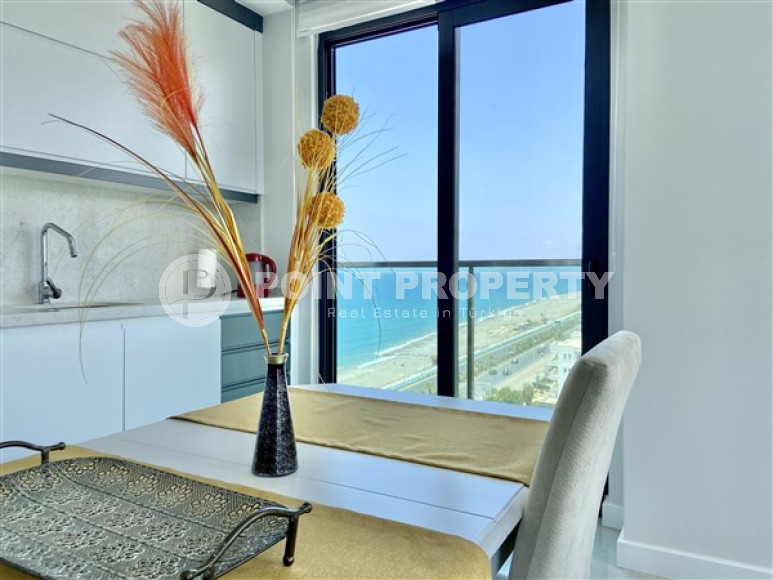 Furnished three-room apartment, 85m², on the first coastline in Mahmutlar, Alanya-id-2412-photo-6