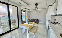 Furnished three-room apartment, 85m², on the first coastline in Mahmutlar, Alanya-id-2412-photo-7