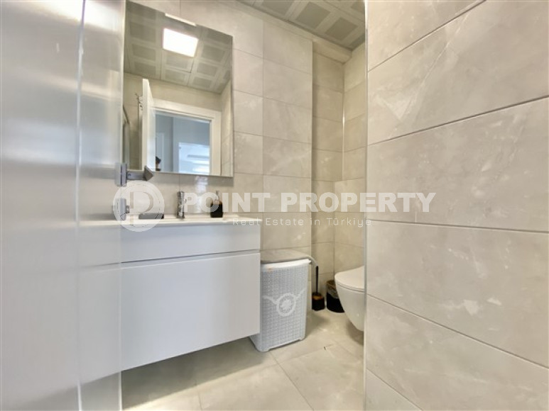 Furnished three-room apartment, 85m², on the first coastline in Mahmutlar, Alanya-id-2412-photo-15