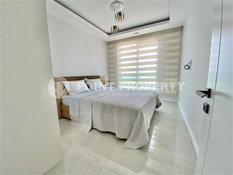 Furnished three-room apartment, 85m², on the first coastline in Mahmutlar, Alanya-id-2412-photo-16