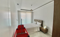 Furnished three-room apartment, 85m², on the first coastline in Mahmutlar, Alanya-id-2412-photo-18