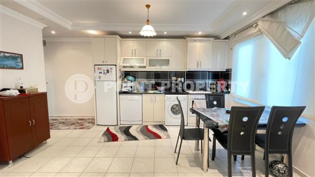 Просторная квартира с одной спальней, 60м², в центре Алании в комплексе с бассейном-id-2415-фото-3