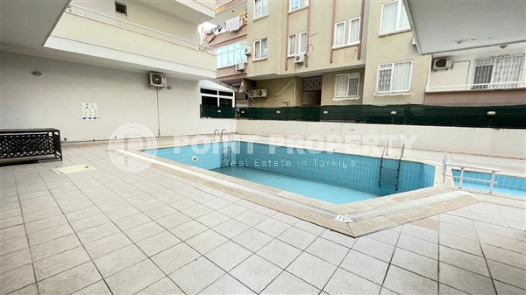 Просторная квартира с одной спальней, 60м², в центре Алании в комплексе с бассейном-id-2415-фото-14