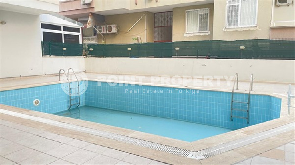 Просторная квартира с одной спальней, 60м², в центре Алании в комплексе с бассейном-id-2415-фото-19