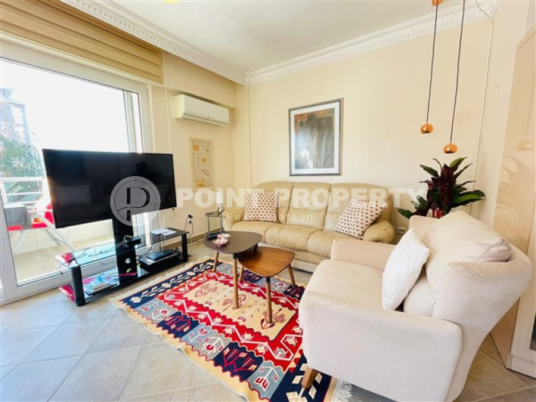 Furnished apartment 1+1, 70m², in a complex with a swimming pool 100m from the sea in Oba, Alanya.-id-2417-photo-2