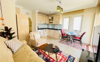 Furnished apartment 1+1, 70m², in a complex with a swimming pool 100m from the sea in Oba, Alanya.-id-2417-photo-3