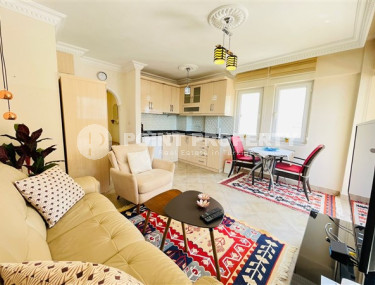 Furnished apartment 1+1, 70m², in a complex with a swimming pool 100m from the sea in Oba, Alanya.-id-2417-photo-3