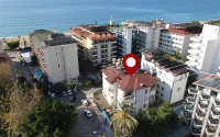 Elegant apartment 1+1, 70m², in an urban building, 100m from the sea in the center of Alanya-id-2426-photo-1