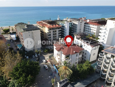 Elegant apartment 1+1, 70m², in an urban building, 100m from the sea in the center of Alanya-id-2426-photo-1