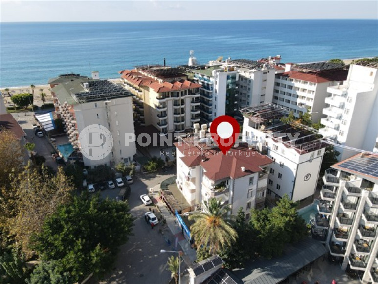 Elegant apartment 1+1, 70m², in an urban building, 100m from the sea in the center of Alanya-id-2426-photo-1