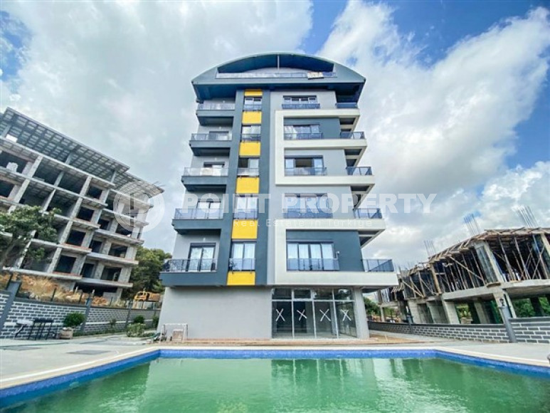 New four-room apartment, 135m², in a complex with a swimming pool in the mountains of Alanya, 3000m from the sea.-id-2432-photo-1