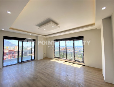 New four-room apartment, 135m², in a complex with a swimming pool in the mountains of Alanya, 3000m from the sea.-id-2432-photo-2