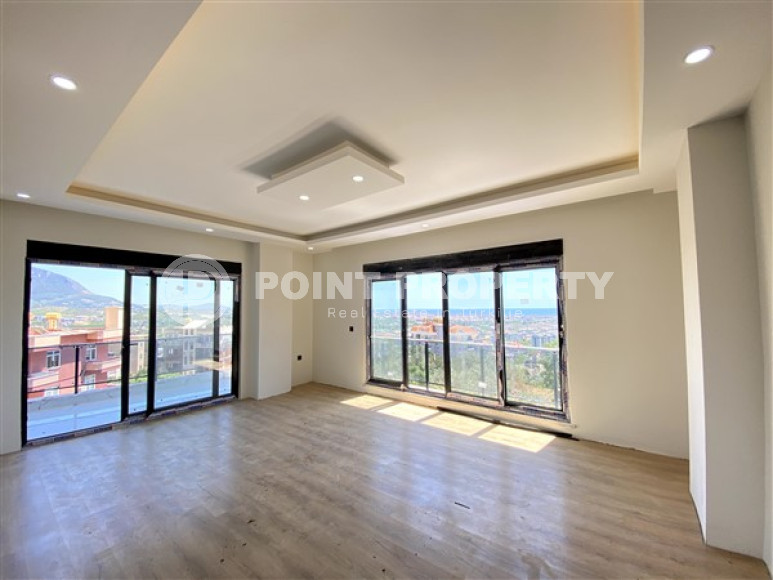 New four-room apartment, 135m², in a complex with a swimming pool in the mountains of Alanya, 3000m from the sea.-id-2432-photo-2