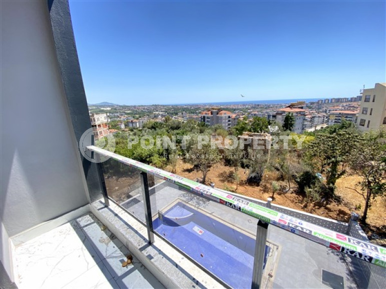 New four-room apartment, 135m², in a complex with a swimming pool in the mountains of Alanya, 3000m from the sea.-id-2432-photo-11