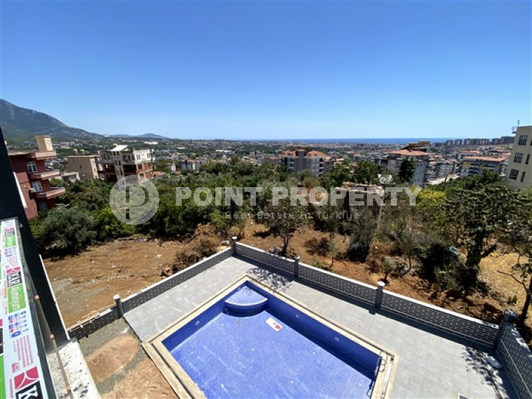 New four-room apartment, 135m², in a complex with a swimming pool in the mountains of Alanya, 3000m from the sea.-id-2432-photo-12