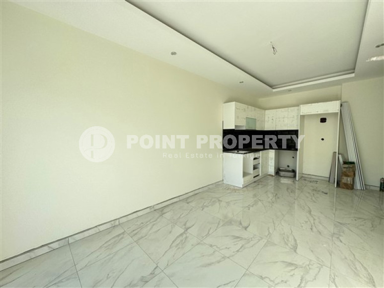 Новая квартира с одной спальней, 65м², в элитном комплексе в 100 метрах от моря в районе Кестель-id-2433-фото-24