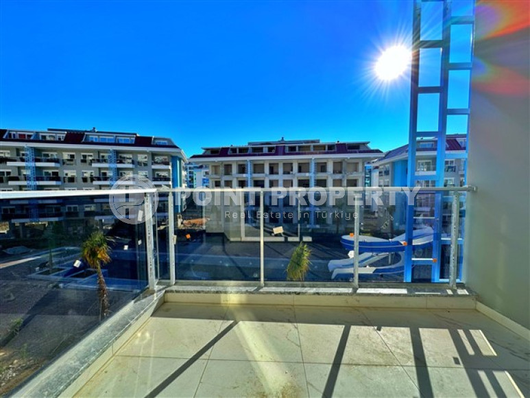 Новая квартира с одной спальней, 65м², в элитном комплексе в 100 метрах от моря в районе Кестель-id-2433-фото-31