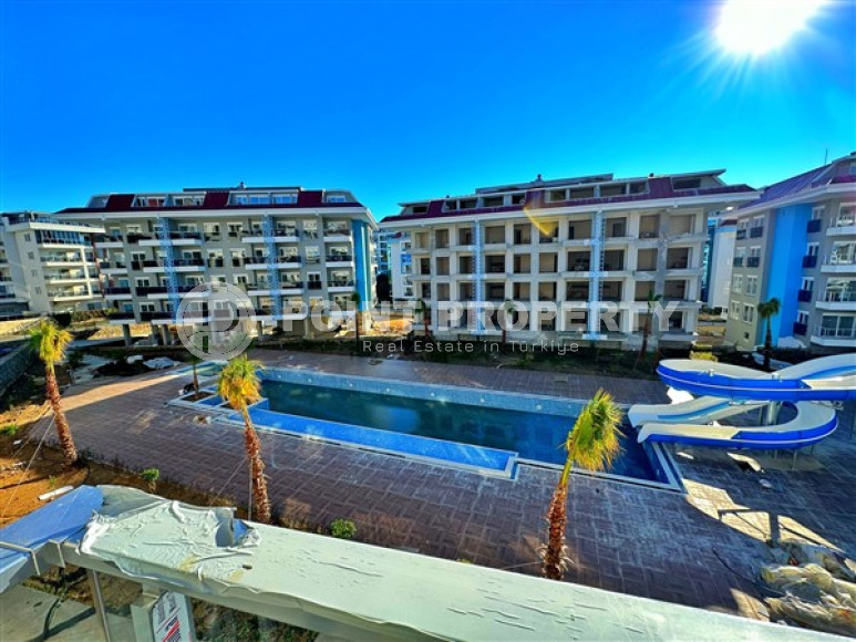 Новая квартира с одной спальней, 65м², в элитном комплексе в 100 метрах от моря в районе Кестель-id-2433-фото-32