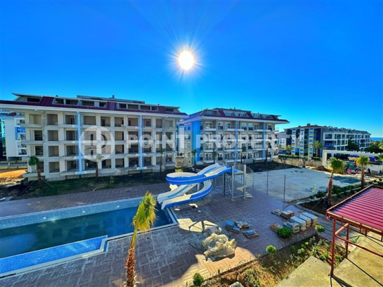 Новая квартира с одной спальней, 65м², в элитном комплексе в 100 метрах от моря в районе Кестель-id-2433-фото-33