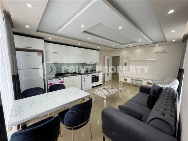 Меблированная квартира с двумя спальнями, 100м², в новом комплексе с бассейном в Махмутларе-id-2437-фото-2