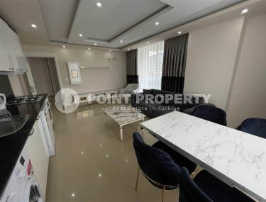 Меблированная квартира с двумя спальнями, 100м², в новом комплексе с бассейном в Махмутларе-id-2437-фото-3