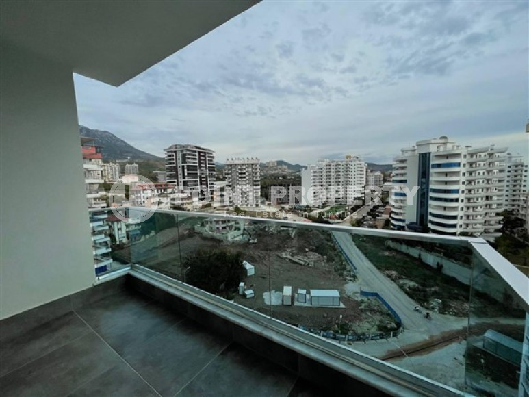 Меблированная квартира с двумя спальнями, 100м², в новом комплексе с бассейном в Махмутларе-id-2437-фото-4