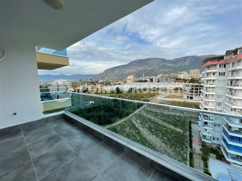 Меблированная квартира с двумя спальнями, 100м², в новом комплексе с бассейном в Махмутларе-id-2437-фото-5