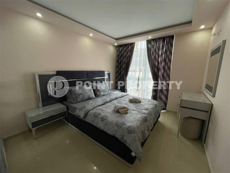 Меблированная квартира с двумя спальнями, 100м², в новом комплексе с бассейном в Махмутларе-id-2437-фото-12