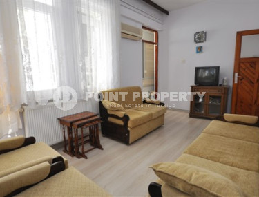 Квартира в турецком доме с тремя спальными комнатами в центре Алании-id-2442-фото-2