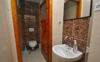 Apartment in a Turkish house with three bedrooms in the center of Alanya-id-2442-photo-12