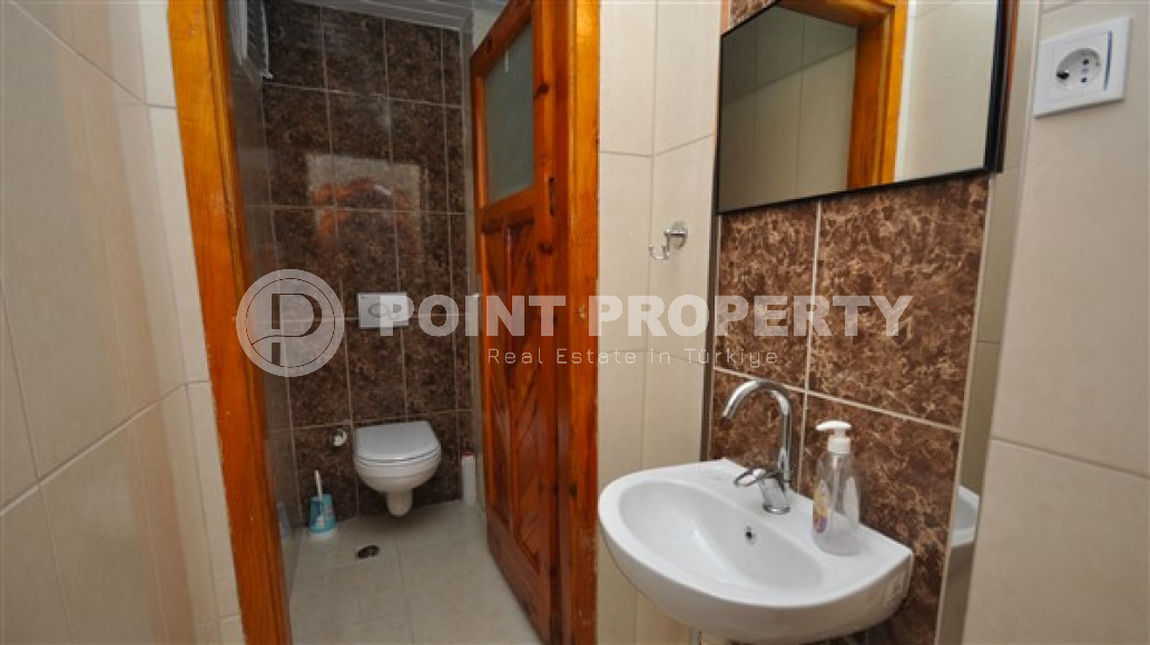 Apartment in a Turkish house with three bedrooms in the center of Alanya-id-2442-photo-12