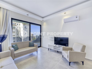 Элегантная двухкомнатная квартира, 65м² в комплексе с отельной инфраструктурой в Махмутларе, Алания-id-2444-фото-4