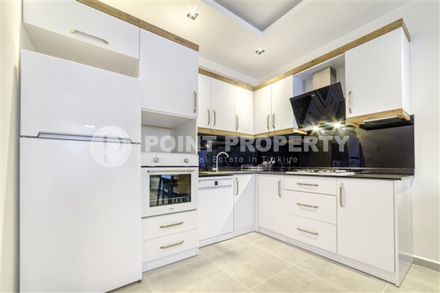 Элегантная двухкомнатная квартира, 65м² в комплексе с отельной инфраструктурой в Махмутларе, Алания-id-2444-фото-5