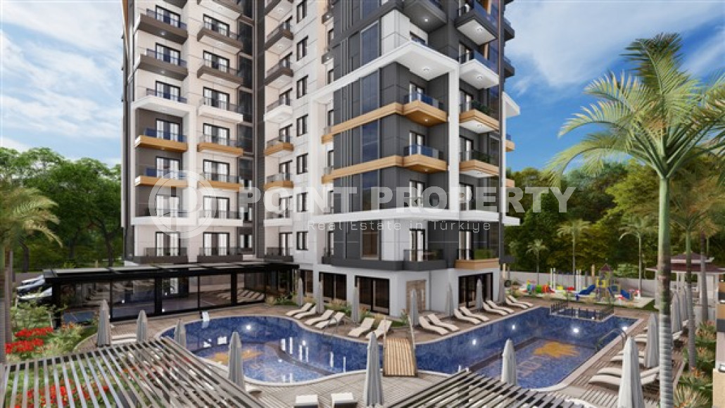 Квартиры 1+1 и 2+1, 42-78м², в комплексе на этапе строительства в Махмутларе, Алания, в 400м от моря-id-2447-фото-2